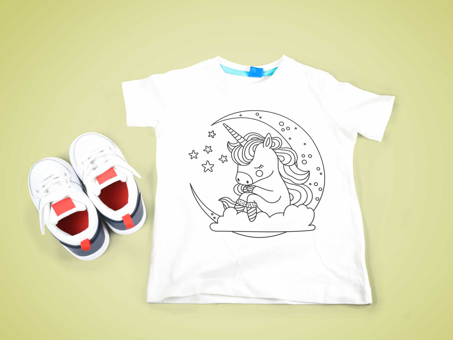 Einhorn auf dem Mond und ein Stern auf einem T-Shirt, ein bezauberndes Ausmal-Bügelmotiv für kreative Bastelstunden.
