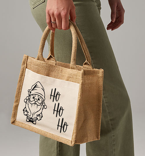 Süße Jutetasche mit Santa Claus, tolle Geschenkverpackung für die Weihnachtszeit.