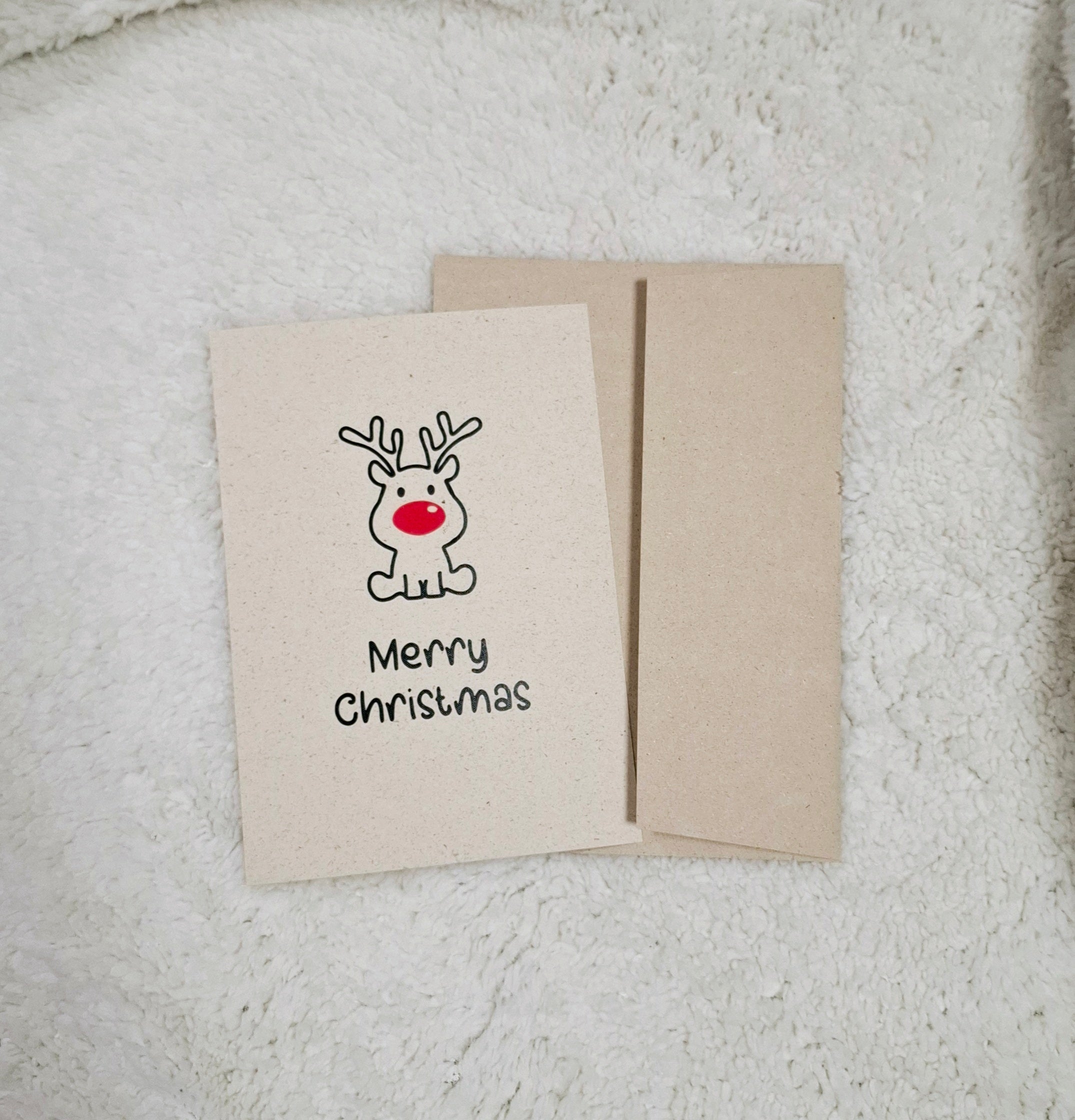  Weihnachtskarte im A5-Format mit einem Rentier und dem Text "Frohe Weihnachten".