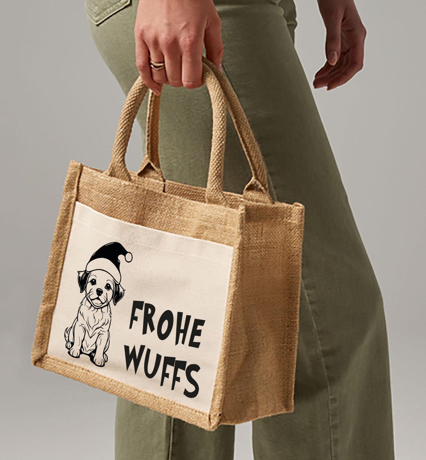 Eine umweltfreundliche Jutetasche, die mit den Worten "froh wuffes" bedruckt ist und Freude ausstrahlt.