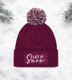 Coole Bommelmütze mit "Let It Snow" – bringt winterliche Freude in deinen Look.
