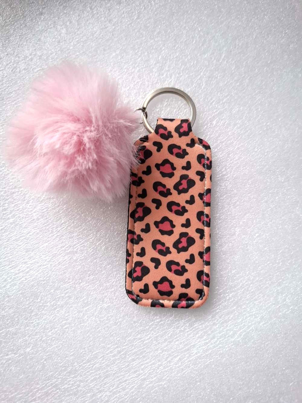 Stylisches Schlüsselband aus Neopren mit Lippenstifthalter & Pom Pom – Animalprint in Rosa/Pink