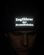 Zugführer der Promillebahn – Schwarze Mütze mit Reflex-Patch für Kohlfahrt & Party